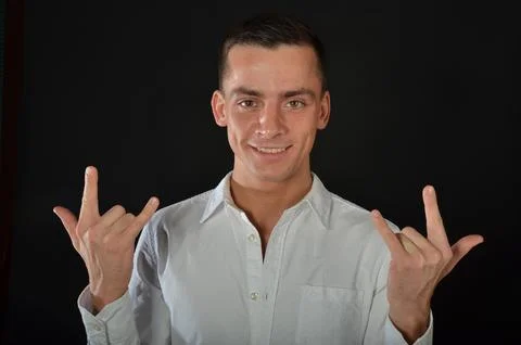 Young handsome man posing in the studio. Stock Photos