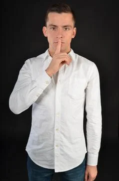 Young handsome man posing in the studio. Stock Photos