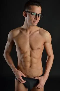 Young handsome man posing in the studio. Stock Photos