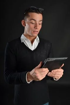 Young handsome man posing in the studio. Foto stock