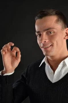 Young handsome man posing in the studio. Stock Photos