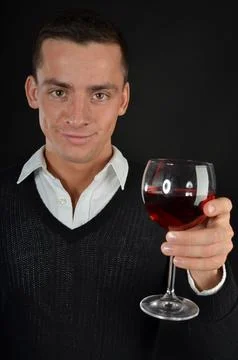 Young handsome man posing in the studio. Stock Photos