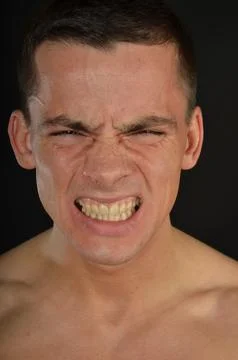 Young handsome man posing in the studio. Stock Photos