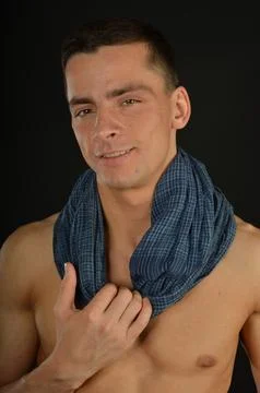 Young handsome man posing in the studio. Stock Photos