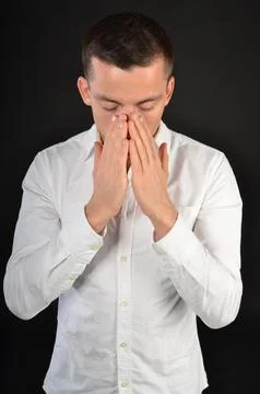 Young handsome man posing in the studio. Stock Photos