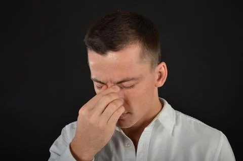 Young handsome man posing in the studio. Stock Photos