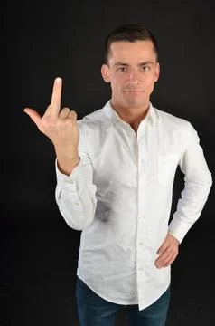 Young handsome man posing in the studio. Stock Photos