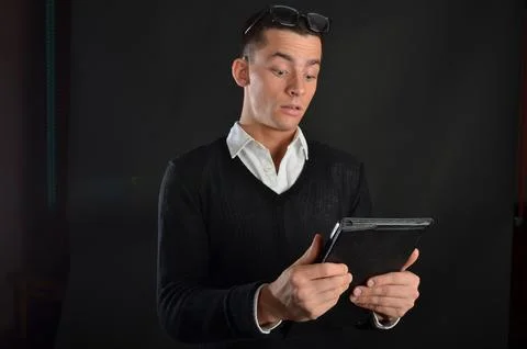 Young handsome man posing in the studio. Stock Photos