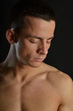 Young handsome man posing in the studio. Stock Photos