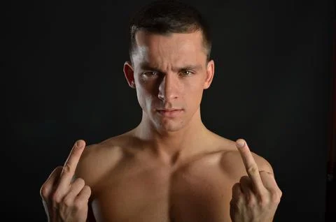 Young handsome man posing in the studio. Stock Photos