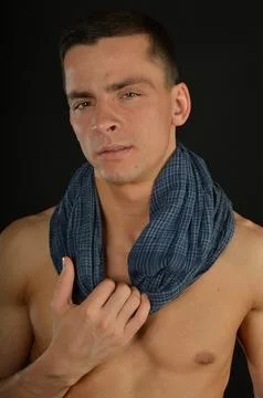 Young handsome man posing in the studio. 스톡 사진