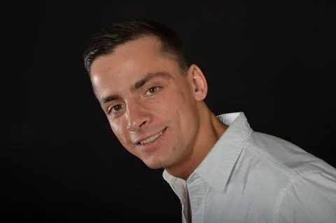 Young handsome man posing in the studio. Stock Photos