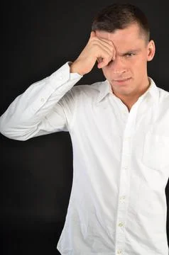 Young handsome man posing in the studio. 스톡 사진