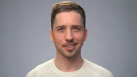 Young handsome man smiling Stock Footage 70485242