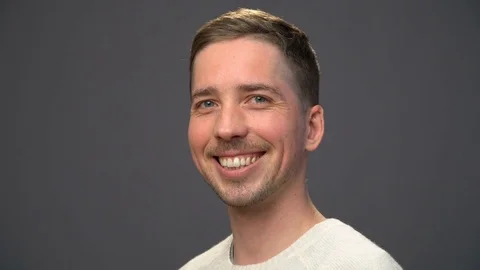 Young handsome man smiling Stock Footage 70485869