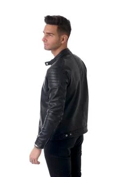 Young handsome man standing in studio shot Stock Photos