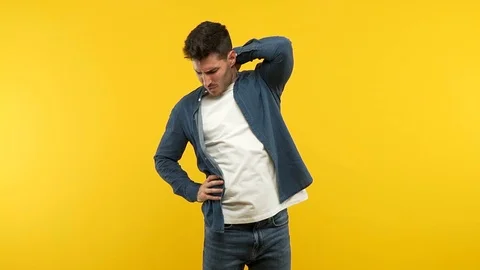 Young handsome man suffering neck pain Stock Footage 97699219