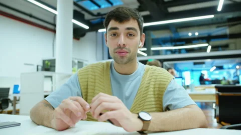 Young Handsome Man Talking on Video Call in Office Stock Footage 243959378