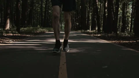Young handsome man train for marathon run in park Stock Footage 169665269