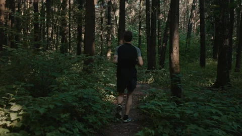 Young handsome man train for marathon run in park Stock Footage 170642537