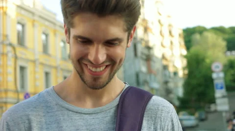 Young handsome man using his phone in city Stock Footage 68598845
