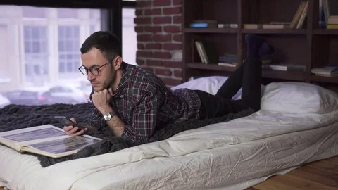 Young handsome man using smartphone Video stock 84848891