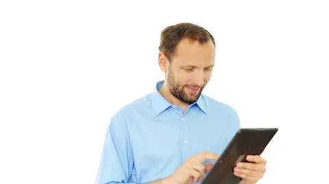 Young handsome man using tablet computer, isolated on white HD Stock Footage 37343762