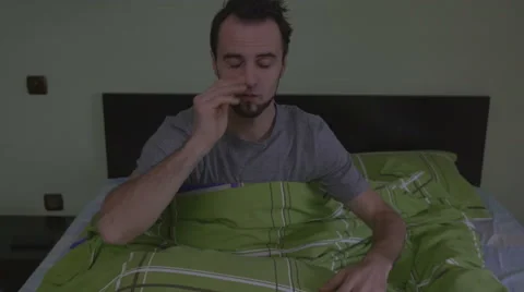 Young handsome man waking up scared Stock Footage 59842471