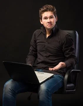 Young handsome man working with laptop 写真素材