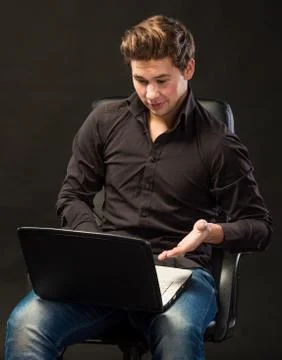 Young handsome man working with laptop 写真素材