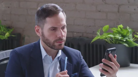Young handsome middle-eastern man conference calling on laptop talks with online Stock Footage 136543217