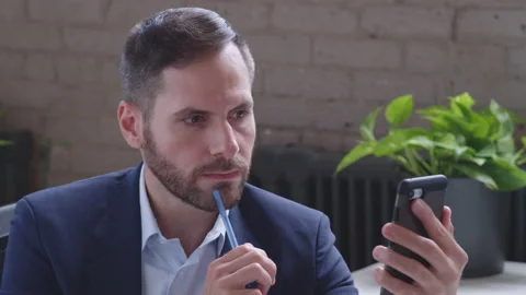 Young handsome middle-eastern man conference calling on laptop talks with online Stock Footage 136545807
