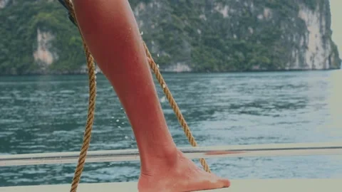 Young handsome sailor pulling rope on sailboat. Action adventure of captain on Видео 220443317