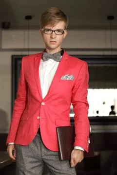 Young handsome stylish man posing indoor Stock Photos