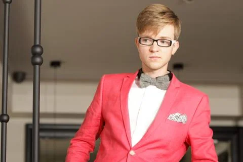 Young handsome stylish man posing indoor Stock Photos