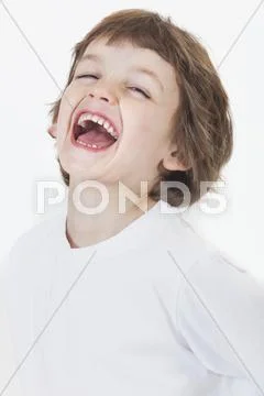 Young happy boy laughing Stock Photos