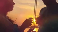 Young Happy Couple In Love Kissing On Yacht And Drink Wine With Glasses At Stock Footage