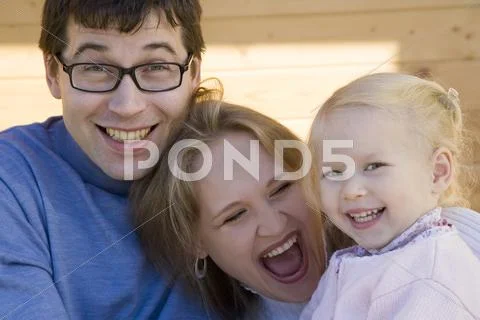 Young happy family Stock Photos