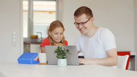 Young happy father checking emails with his cute little daughter Video stock 156012414