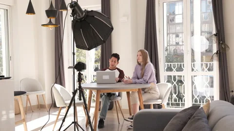 Young happy friends sharing content on streaming platform with camera - Moder Stock Footage