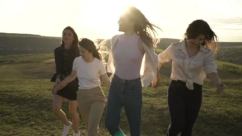 Young happy girlfriends having fun Stock Footage 130473474