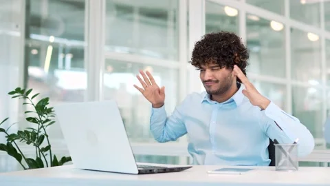 Young happy IT professional programmer finished working on a project on a laptop Stock Footage 237329837