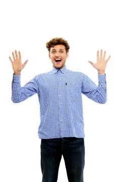 Young happy man in casual cloth with raised hands up Stock Photos