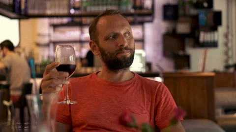 Young, happy man drinking wine in bar on the city, 4K 스톡 동영상 89577770