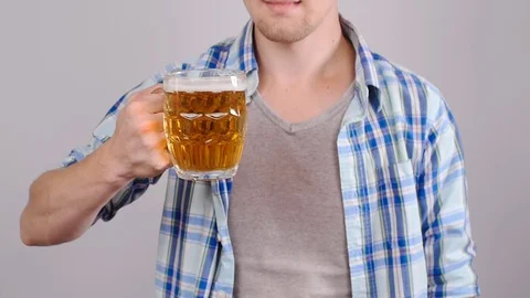 Young happy man tasting a draft beer Stock Footage 78675751