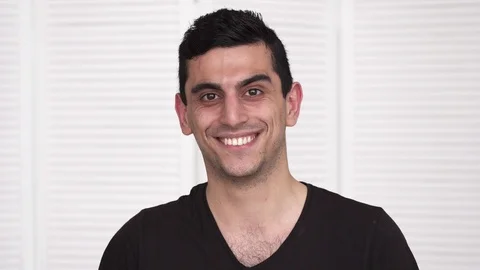 Young happy middle eastern man smiling Stock Footage 86381841