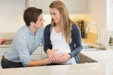 Young happy pregnant woman with  husband Stock Photos