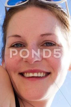 Young happy woman smiling Stock Photos