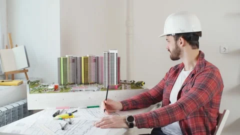 Young hard-working man work in office. Stock Footage 127039536