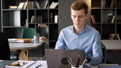 Young hardworking man take part in video conference call to report to boss using Stock Footage 79785135